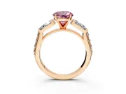 Channel-Set Engagement Ring Setting for Fancy Pink Round Cut Center with Baguette Band and Prong Head in Rose Gold