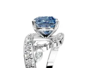 Solitaire Engagement Ring Setting for Fancy Blue Cushion Cut Center with Pave Bypass Twist Band and Prong Head in Platinum