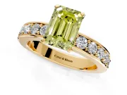Solitaire Engagement Ring Setting for Fancy Yellow Emerald Cut Center with Channel-Set Accents and Prong Head in Yellow Gold