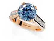 Solitaire Engagement Ring Setting for Fancy Blue Round Cut Center with Channel Band and Double Claw Prong Head in Rose Gold