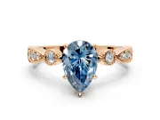 Solitaire Engagement Ring Setting for Fancy Blue Pear-Shaped Center with Milgrain Bezel Accents and Prong Head in Rose Gold