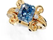 Solitaire Engagement Ring Setting for Fancy Blue Radiant Cut Center with Twisted Band and Scroll Prong Head in Yellow Gold