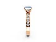 Solitaire Engagement Ring Setting for Fancy Blue Radiant Cut Center with Channel-Set Accents and Prong Head in Rose Gold