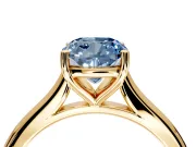 Solitaire Engagement Ring Setting for Fancy Blue Cushion Cut Center with Narrow Cathedral Band and Prong Head in Yellow Gold