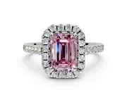 Halo Engagement Ring Setting for Fancy Pink Emerald Cut Center with Narrowing Pave Band and Prong Head in White Gold