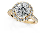 Halo Engagement Ring Setting for Round Cut Center with Narrowing Pave Band and Prong Head in Yellow Gold