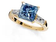 3 Stone Engagement Ring Setting for Fancy Blue Princess Cut Center with Tapered Baguettes, Plain Band and Prong Head in Yellow Gold