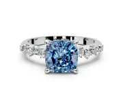 Solitaire Engagement Ring Setting for Fancy Blue Cushion Cut Center with Trailing Leaf Accent Band and Prong Head in Platinum