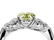 Cluster Engagement Ring Setting for Fancy Yellow Oval Center with Round Cut Accent Frame and Prong Head in Platinum