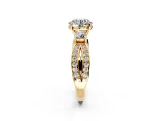 3 Stone Engagement Ring Setting for Round Cut Center with Pave Twist Band and Prong Head in Yellow Gold