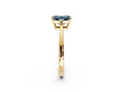 3 Stone Engagement Ring Setting for Fancy Blue Emerald Cut Center with Low-Set Round Cut Accents and Prong Head in Yellow Gold