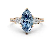 3 Stone Engagement Ring Setting for Fancy Blue Marquise Center with Round Cut Side Accents and Prong Head in Rose Gold