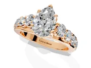 Solitaire Engagement Ring Setting for Pear-Shaped Center with Graduated Shared Prongs and Prong Head in Rose Gold