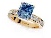Solitaire Engagement Ring Setting for Fancy Blue Radiant Cut Center with Channel-Set Accents and Prong Head in Yellow Gold