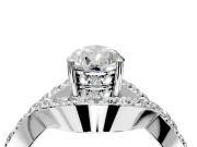 Halo Engagement Ring Setting for Pear-Shaped Center with Pave Infinity Twist Band and Prong Head in Sterling Silver
