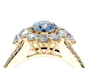 Halo Engagement Ring Setting for Fancy Blue Pear-Shaped Center with Two-Strand Split Shank and Prong Head in Yellow Gold