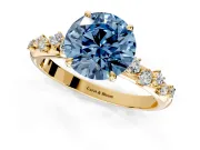 Cluster Engagement Ring Setting for Fancy Blue Round Cut Center with Round Cut Accent Band and Prong Head in Yellow Gold