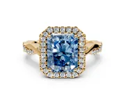 Halo Engagement Ring Setting for Fancy Blue Radiant Cut Center with Twist Band and Prong Head in Yellow Gold