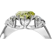 3 Stone Engagement Ring Setting for Fancy Yellow Heart-Shaped Center with Raised Basket Heads and Prong Head in Platinum