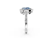 Halo Engagement Ring Setting for Fancy Blue Pear-Shaped Center with Heart-Shaped Openwork, Pave Band and Prong Head in Platinum