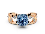 Solitaire Engagement Ring Setting for Fancy Blue Cushion Cut Center with Criss-Cross Accent Band and Prong Head in Rose Gold