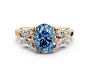 Floral Engagement Ring Setting for Fancy Blue Oval Center with Marquise Cluster Shoulders and Prong Head in Yellow Gold