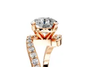 Solitaire Engagement Ring Setting for Round Cut Center with Pave Bypass Swirl Band and Prong Head in Rose Gold