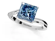 Solitaire Engagement Ring Setting for Fancy Blue Princess Cut Center with Plain Bypass Twist Band and Prong Head in Platinum