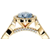 Halo Engagement Ring Setting for Fancy Blue Pear-Shaped Center with Twist Band and Prong Head in Yellow Gold