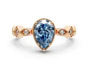 Milgrain Bezel Engagement Ring Setting for Fancy Blue Pear-Shaped Center with Marquise Stations and Bezel Head in Rose Gold