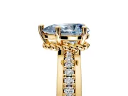 Solitaire Engagement Ring Setting for Fancy Blue Pear-Shaped Center with Raised Channel Band and Prong Head in Yellow Gold