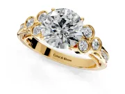 Cluster Engagement Ring Setting for Round Cut Center with Bezel Accent Clusters and Prong Head in Yellow Gold