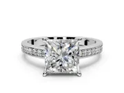 Solitaire Engagement Ring Setting for Princess Cut Center with Channel-Set Accent Band and Prong Head in Platinum