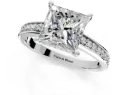 Solitaire Engagement Ring Setting for Princess Cut Center with Channel-Set Accent Band and Prong Head in Platinum