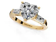 3 Stone Engagement Ring Setting for Heart-Shaped Center with Tapered Baguettes, Plain Band and Prong Head in Yellow Gold