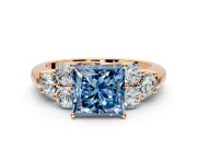 Cluster Engagement Ring Setting for Fancy Blue Princess Cut Center with Round Cut Accent Frame and Prong Head in Rose Gold