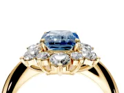 Small-Accent Cluster Halo Engagement Ring Setting for Fancy Blue Radiant Cut Center with Plain Band and Prong Head in Yellow Gold