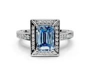 Halo Engagement Ring Setting for Fancy Blue Emerald Cut Center with Framed Halo, Pave Band and Prong Head in White Gold
