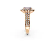 Large Accent Halo Engagement Ring Setting for Fancy Pink Emerald Cut Center with Pave Split Shank and Prong Head in Rose Gold