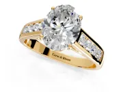 Solitaire Engagement Ring Setting for Oval Center with Cathedral Channel Band and Prong Head in Yellow Gold