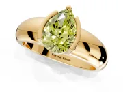 Tension Engagement Ring Setting for Fancy Yellow Pear-Shaped Center with Wide Flat Band and Tension Head in Yellow Gold