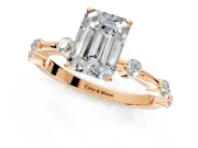 Solitaire Engagement Ring Setting for Emerald Cut Center with Bezel Station Band and Prong Head in Rose Gold