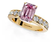 Solitaire Engagement Ring Setting for Fancy Pink Emerald Cut Center with Channel-Set Accents and Prong Head in Yellow Gold