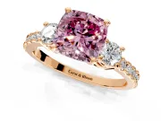 3 Stone Engagement Ring Setting for Fancy Pink Cushion Cut Center with Round Cut Side Accents and Prong Head in Rose Gold