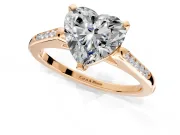Solitaire Engagement Ring Setting for Heart-Shaped Center with Channel Accents and Prong Head in Rose Gold