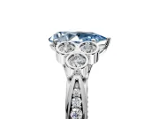 Cluster Engagement Ring Setting for Fancy Blue Pear-Shaped Center with Bezel Accent Clusters and Prong Head in Sterling Silver