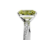 Side Accent Engagement Ring Setting for Fancy Yellow Emerald Cut Center with Accent Shoulders and Prong Head in Sterling Silver