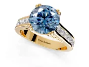 Solitaire Engagement Ring Setting for Fancy Blue Round Cut Center with Channel Band and Double Claw Prong Head in Yellow Gold