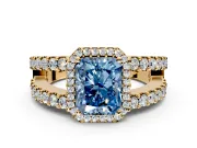 Halo Engagement Ring Setting for Fancy Blue Radiant Cut Center with Wide-Open Pave Split Shank and Prong Head in Yellow Gold