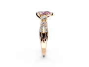 3 Stone Engagement Ring Setting for Fancy Pink Pear-Shaped Center with Pave Split Shank and Prong Head in Rose Gold